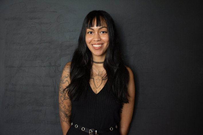 Gale Linares wearing a black top smiling at the camera