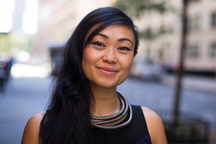 A color headshot of Kimberly Tate smiling and looking at the camera.