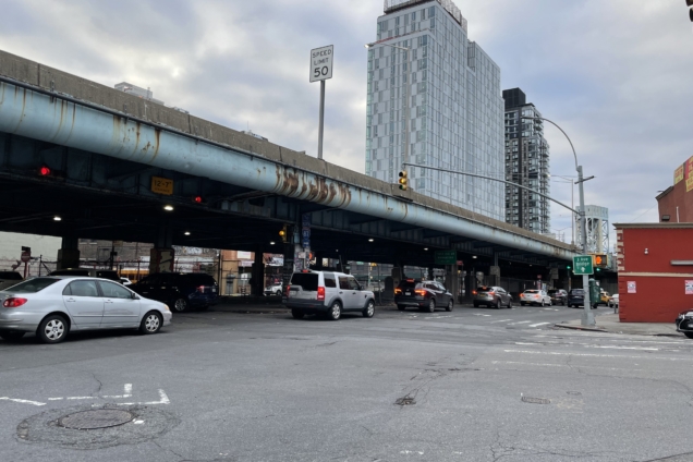 An image of the Cross Bronx Expressway with cars driving underneath it.