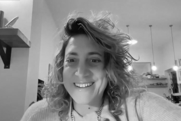 A black and white screen capture image of Rinat Sherzer, a DSI alumna.