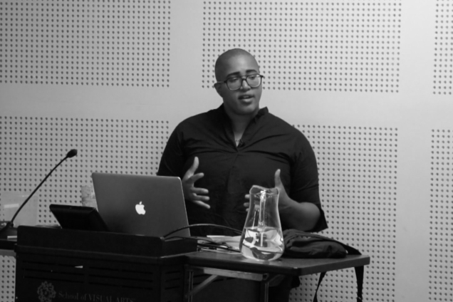 A person standing at a podium giving a speech.