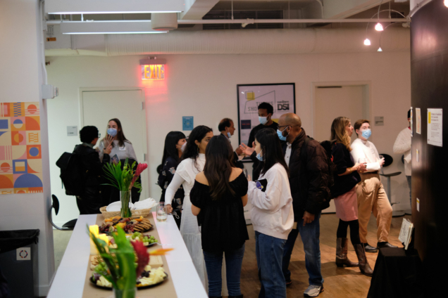 DSI Open House reception with people and food.