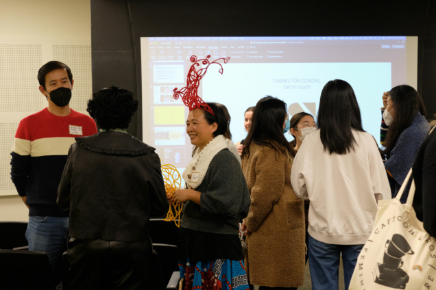 DSI Open House with attendees in the auditorium