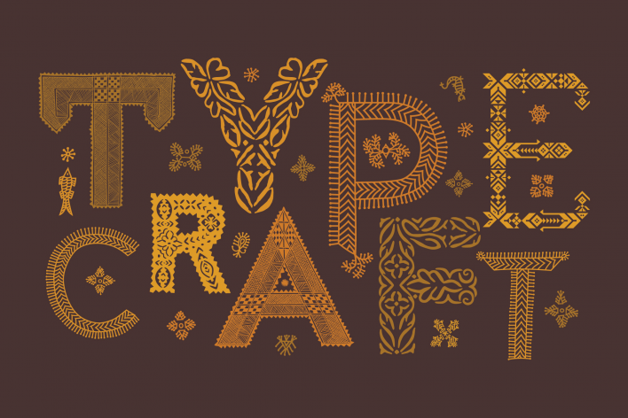 Yellow handcut letterforms in south-indian craft style that says 