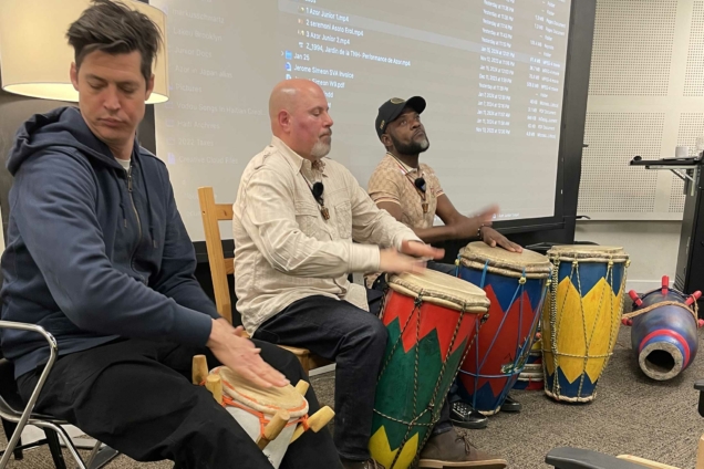 Drummer Ches Smith, Jerome Simeon AKA Junior Racine Mapou, and drummer Markus Schwartz in the MFA DSI Auditorium.