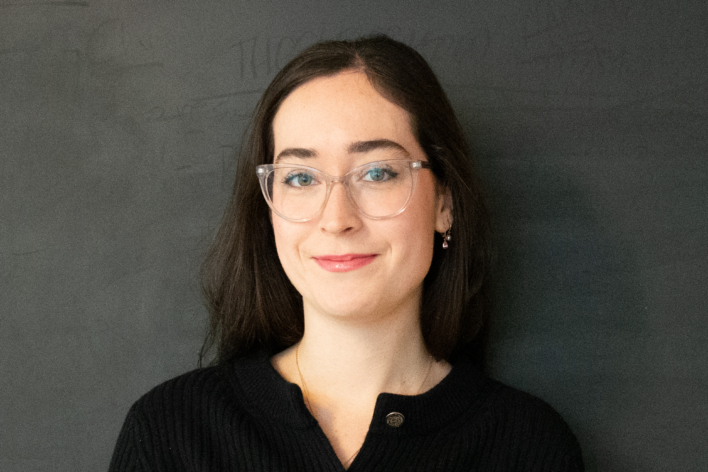 A woman smiling at the camera