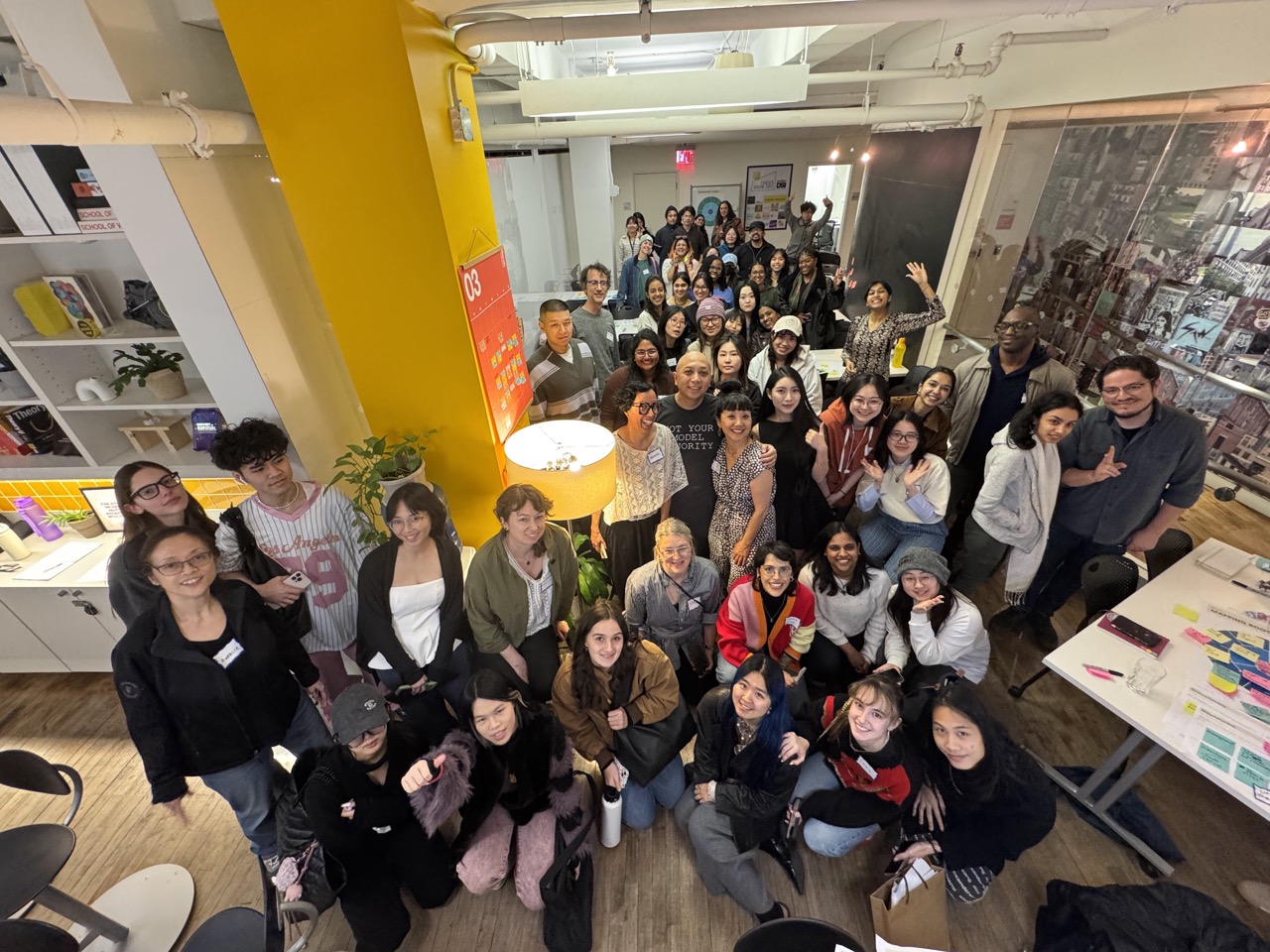 A group of graduate students and George Aye from Greater Good Studio in the SVA MFA DSI space.