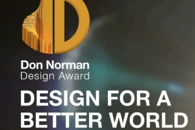 Don Norman Design Award logo with DESIGN FOR A BETTER WORLD on a dark background.